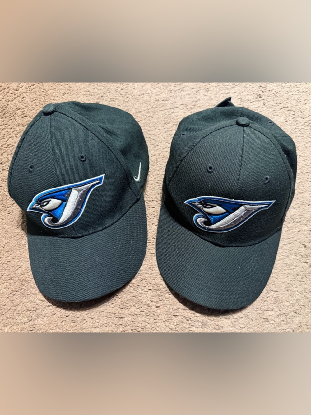2 vintage Nike Black Cap with BlueJays Logo